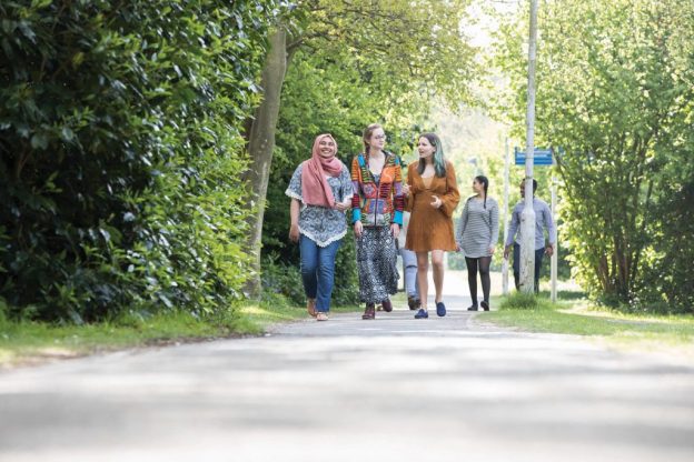 students walking on campus