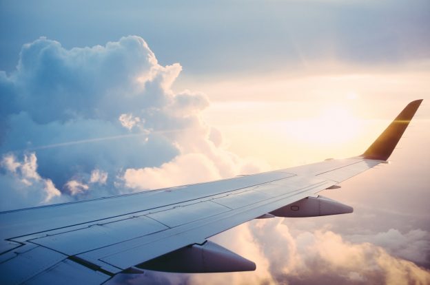 Wing of aeroplane in the sky